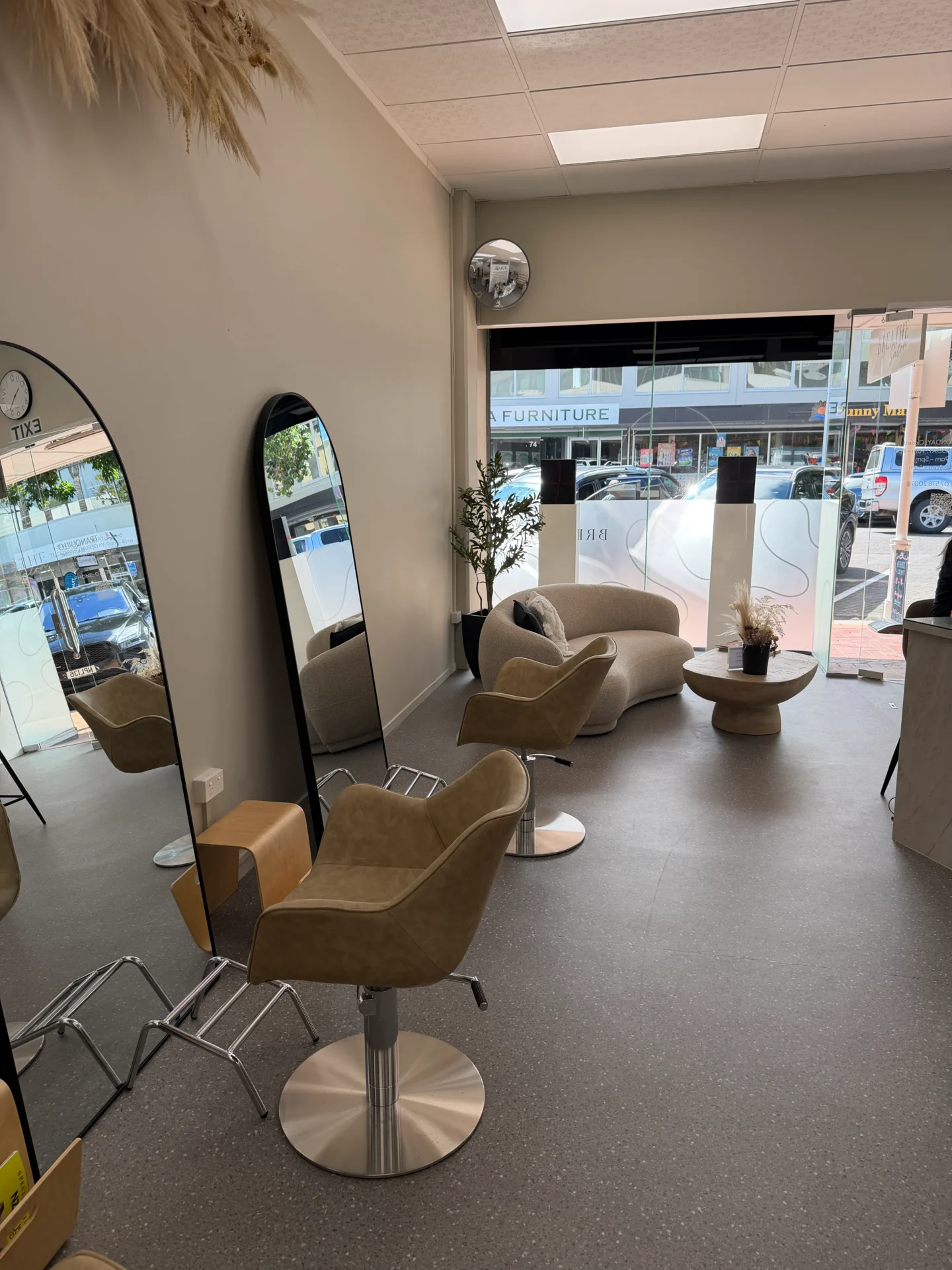 Modern salon interior with chairs and mirrors