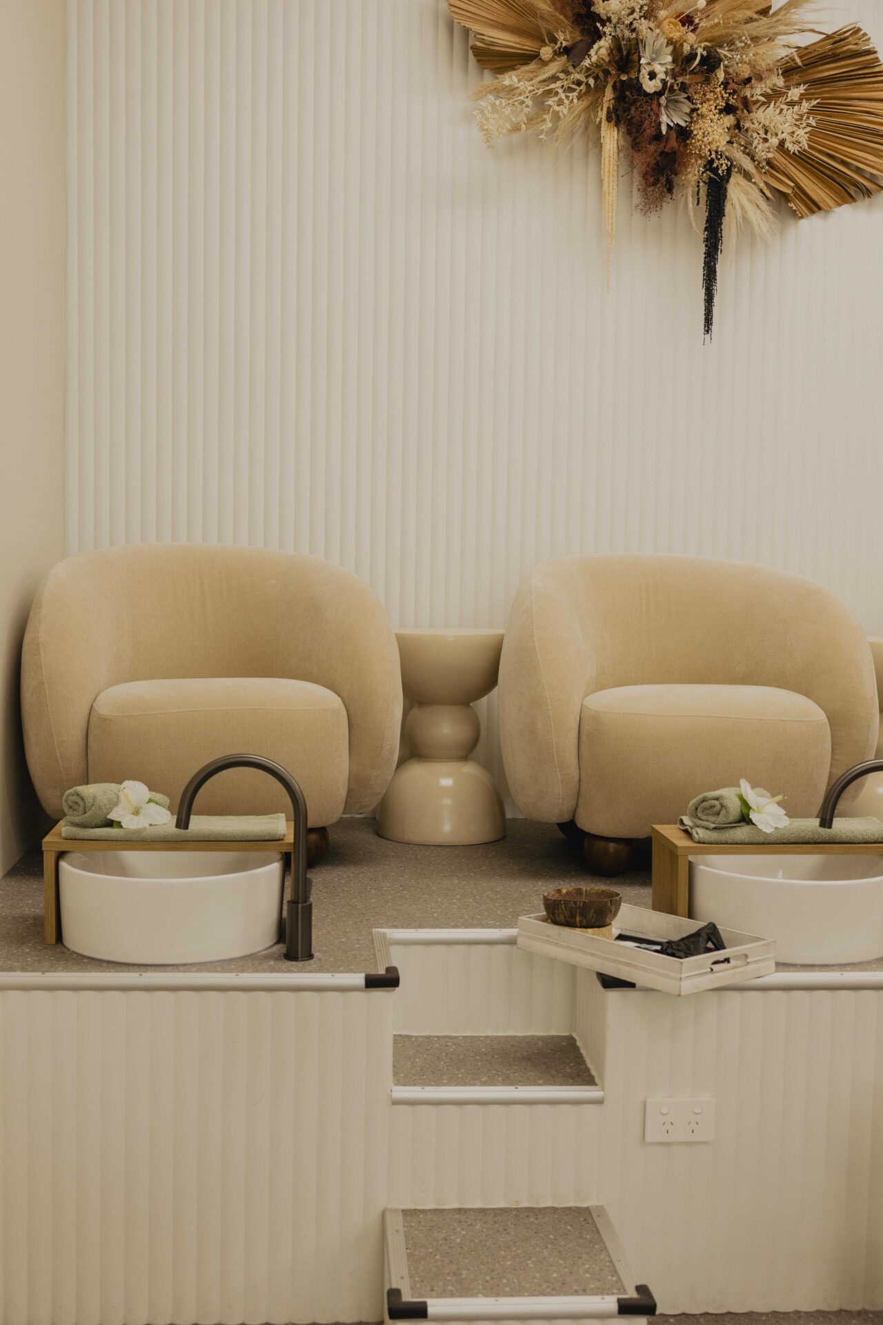 Luxurious pedicure station with comfy chairs.