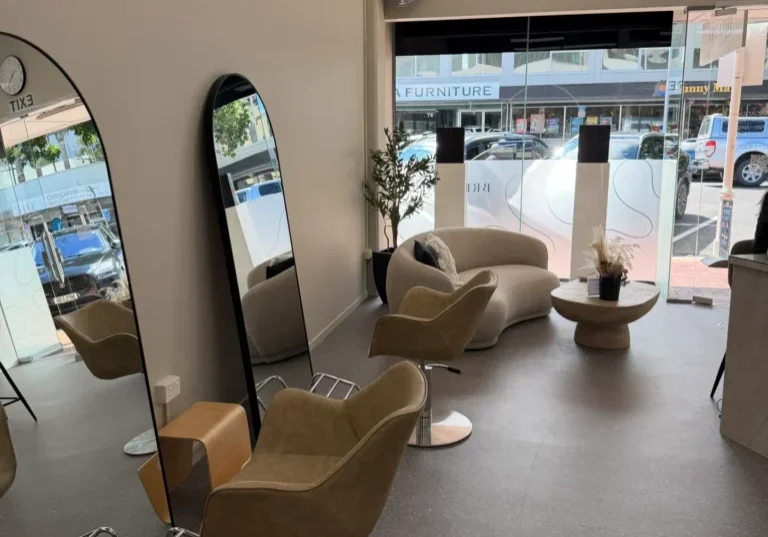 Modern salon interior with chairs and mirrors